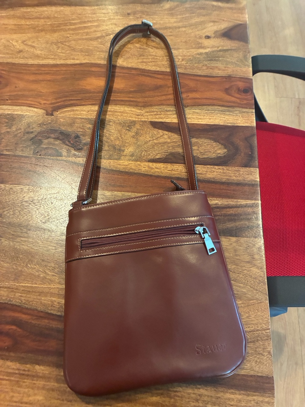 Stauer Women's Burgundy Leather Crossbody Bag with Front Zip Pocket